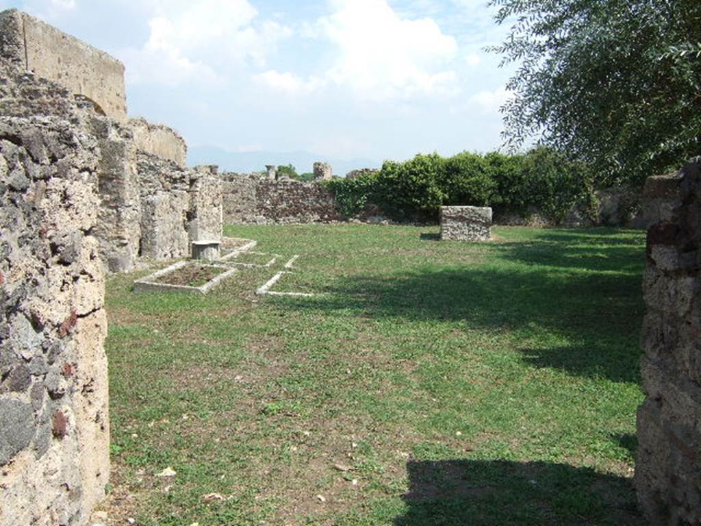 VI.5.7 Pompeii. September 2005. Looking east. According to Jahemski, this large garden was planted in an area, where an abandoned building had been cleared. See Jashemski, W. F., 1993. The Gardens of Pompeii, Volume II: Appendices. New York: Caratzas. (p.126)