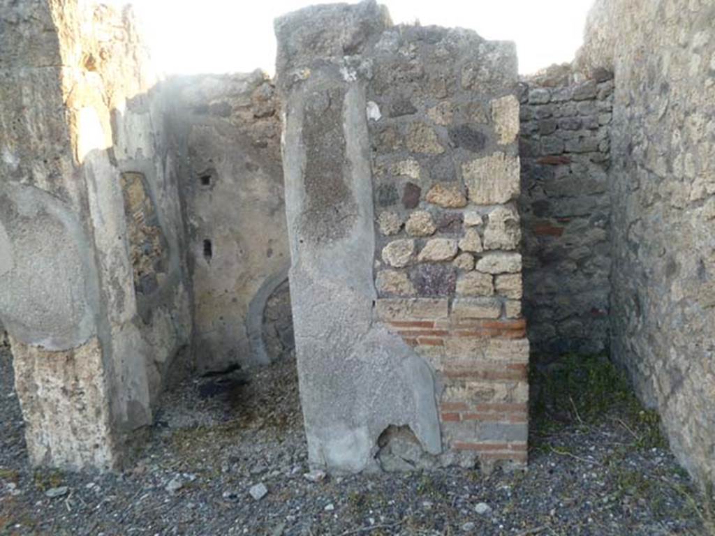 VI.5.8 Pompeii, May 2011. Doorways to rooms in north-west corner of atrium, looking west. 
According to Fiorelli, the doorway on the left was a storeroom or cupboard, with stairs to upper floor.
See Pappalardo, U., 2001. La Descrizione di Pompei per Giuseppe Fiorelli (1875). Napoli: Massa Editore. (p.54)