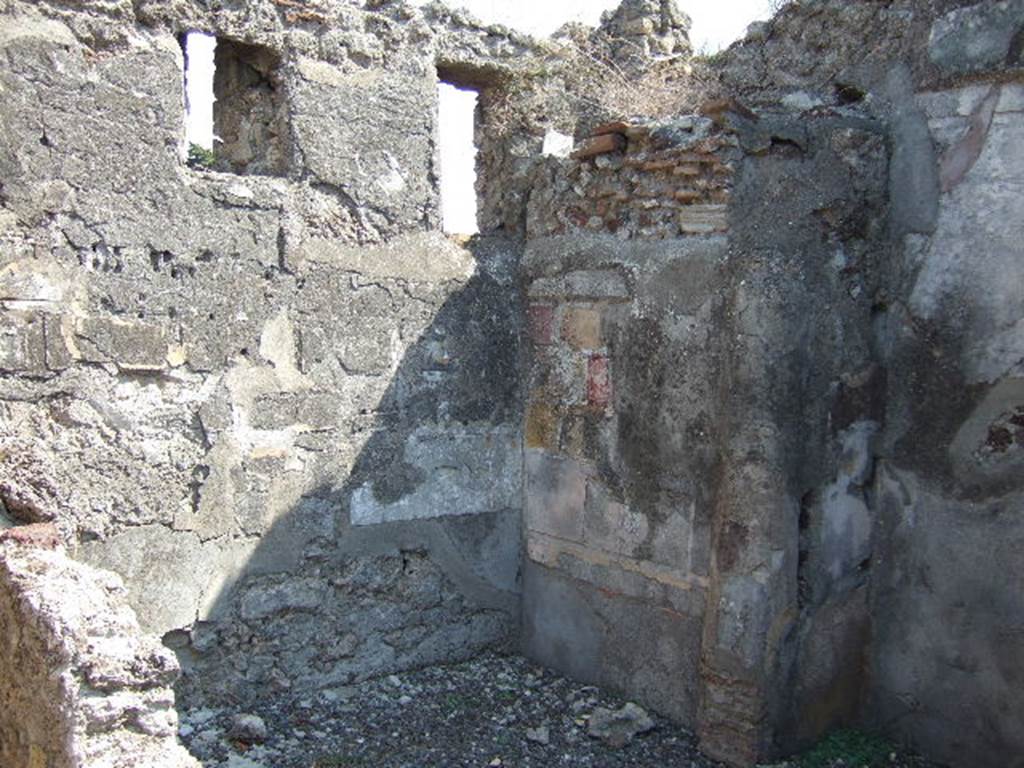 VI.5.19 Pompeii. September 2005. Looking south-east to cubiculum in corner of atrium.