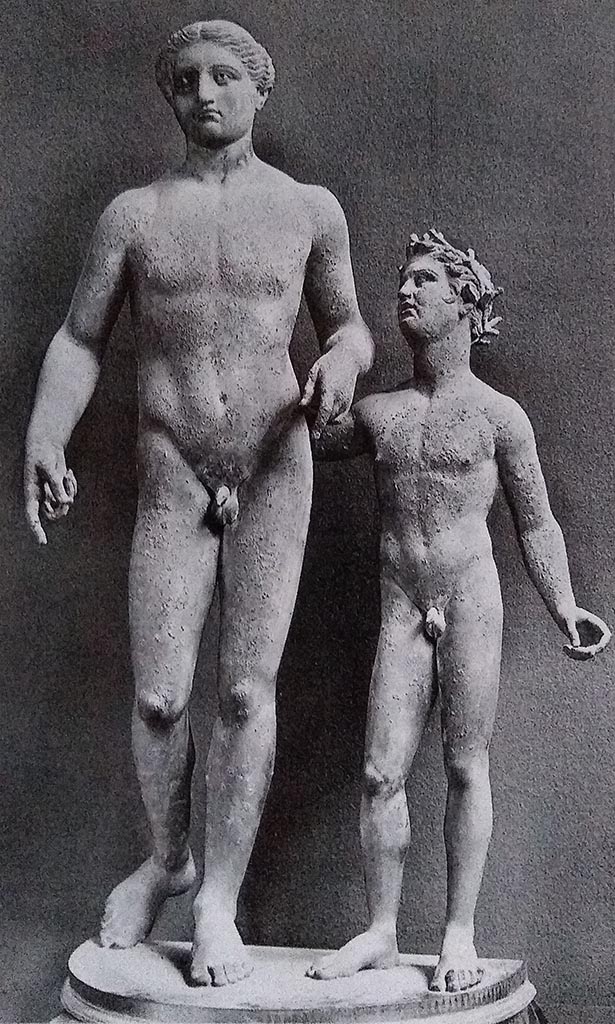 Found 19th August 1813 in VI.6.1 Pompeii. Bronze group of Bacchus and a satyr.
According to Jashemski, this was found in a kettle in the portico and may have been rescued from the garden to protect it from the lapilli.
Now in Naples Archaeological Museum. Inventory number 4995.
Along with the statue was the bronze lampstand to which was attached the small statuette of Bacchus riding a leopard.
Now in Naples Archaeological Museum. Inventory number 4563.
See Jashemski, W. F., 1993. The Gardens of Pompeii, Volume II: Appendices. New York: Caratzas, p. 127 fig. 135.