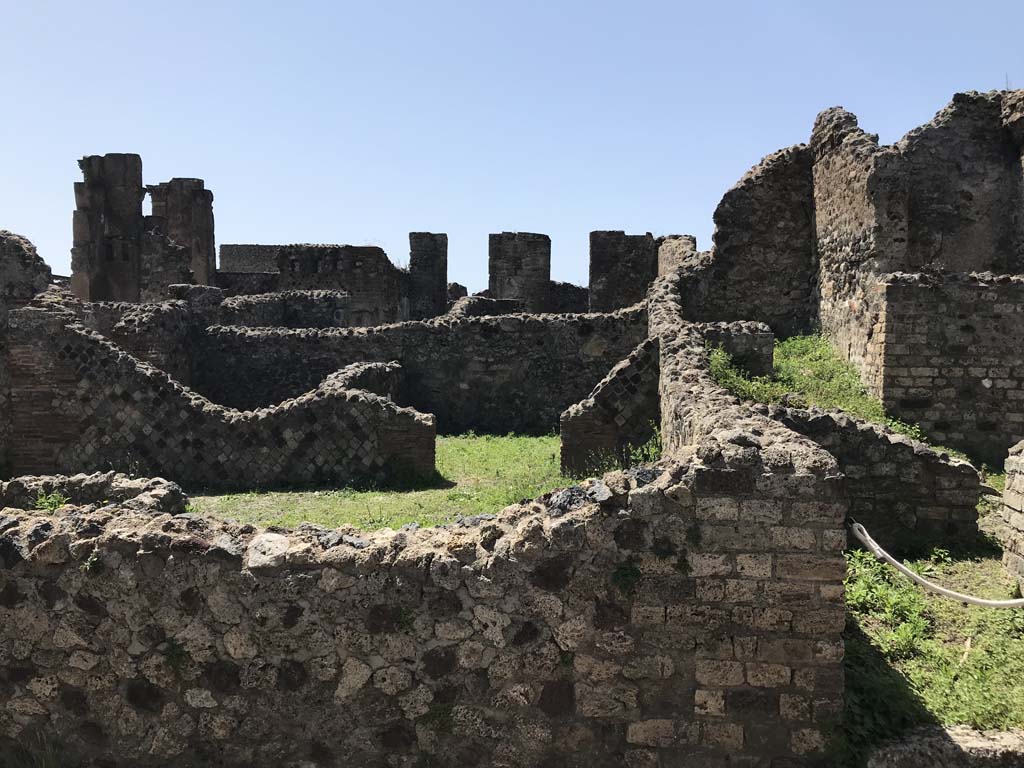 VI.6.7 Pompeii, on right behind entrance at VI.6.6, steps leading to an upper floor apartment. April 2019.
On the left, at the rear (of the steps), can be seen the remains of a passageway leading to the kitchen and latrine.
Photo courtesy of Rick Bauer.