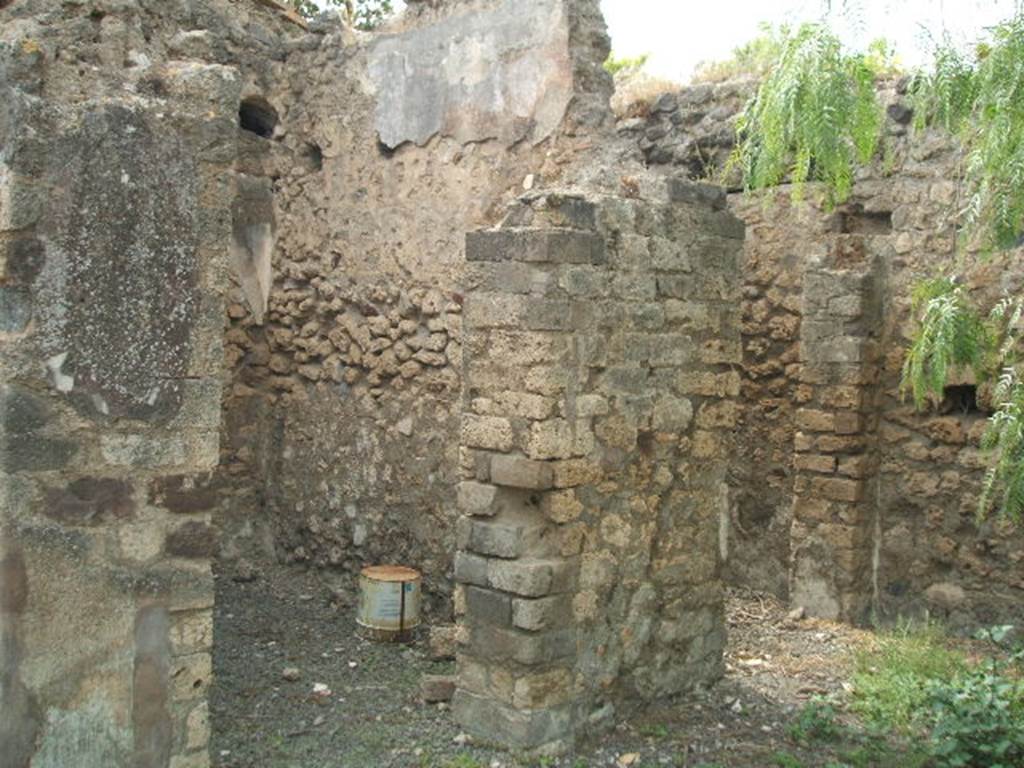 VI.6.10 Pompeii. May 2005. Two doorways to rooms in north-west corner of atrium.