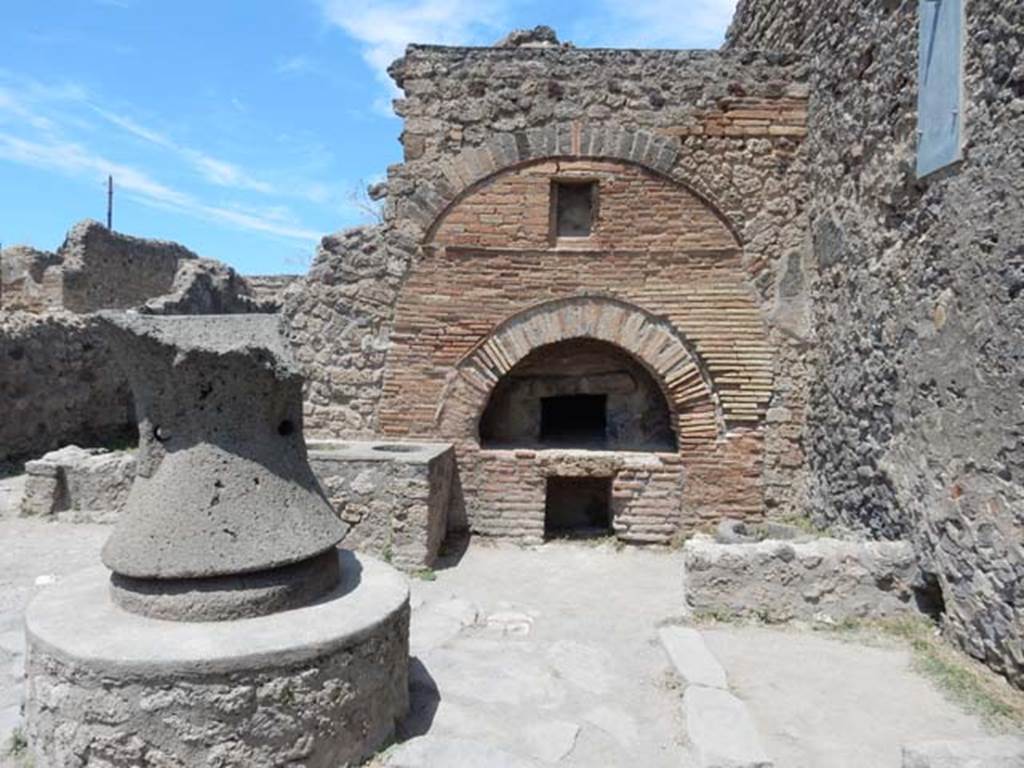 VI.6.17 Pompeii. May 2017. Looking towards oven in bakery.  The bin sunk into the floor was found near the east wall, on the right. Photo courtesy of Buzz Ferebee.