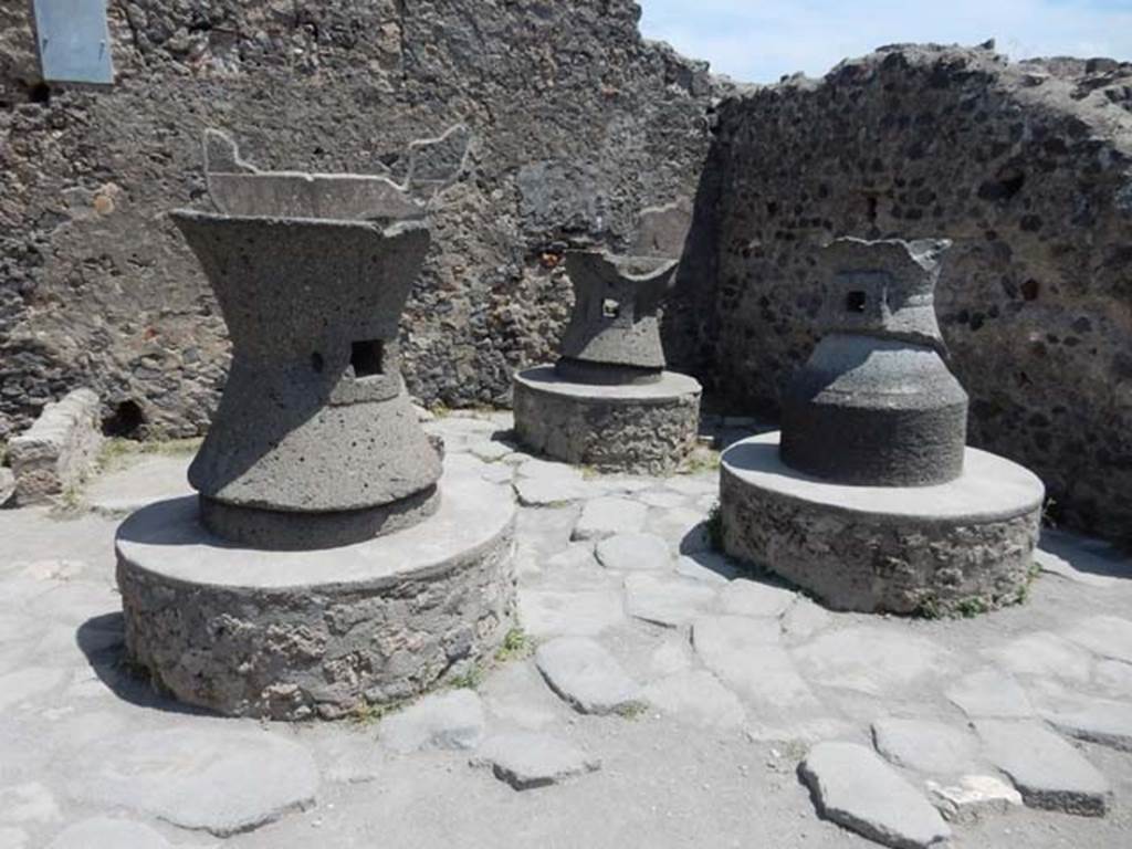 VI.6.17 Pompeii. May 2017. Looking towards south-east corner of bakery with three mills.  Photo courtesy of Buzz Ferebee.