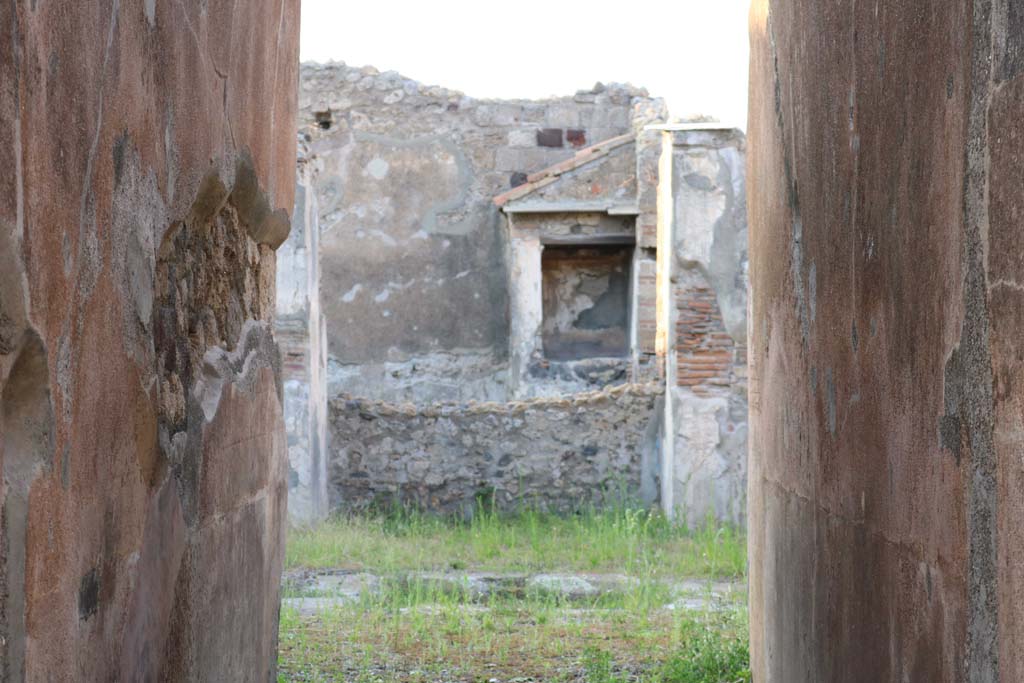 VI.7.6 Pompeii. December 2018. 
Looking north across atrium towards tablinum and garden with lararium. Photo courtesy of Aude Durand.