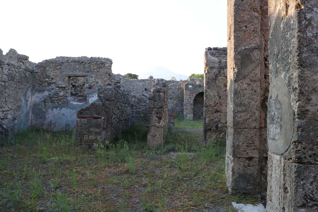 VI.7.9 Pompeii. December 2018. 
Looking north across atrium towards doorway linking with VI.7.10 and 11 with arched recess, centre right. Photo courtesy of Aude Durand.