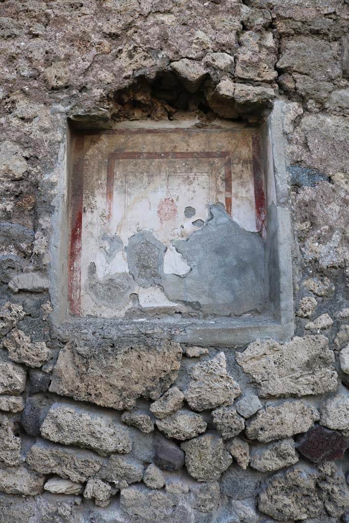 VI.7.9 Pompeii. December 2018. 
Niche on west wall in south ala, with head of the Gorgon. Photo courtesy of Aude Durand.