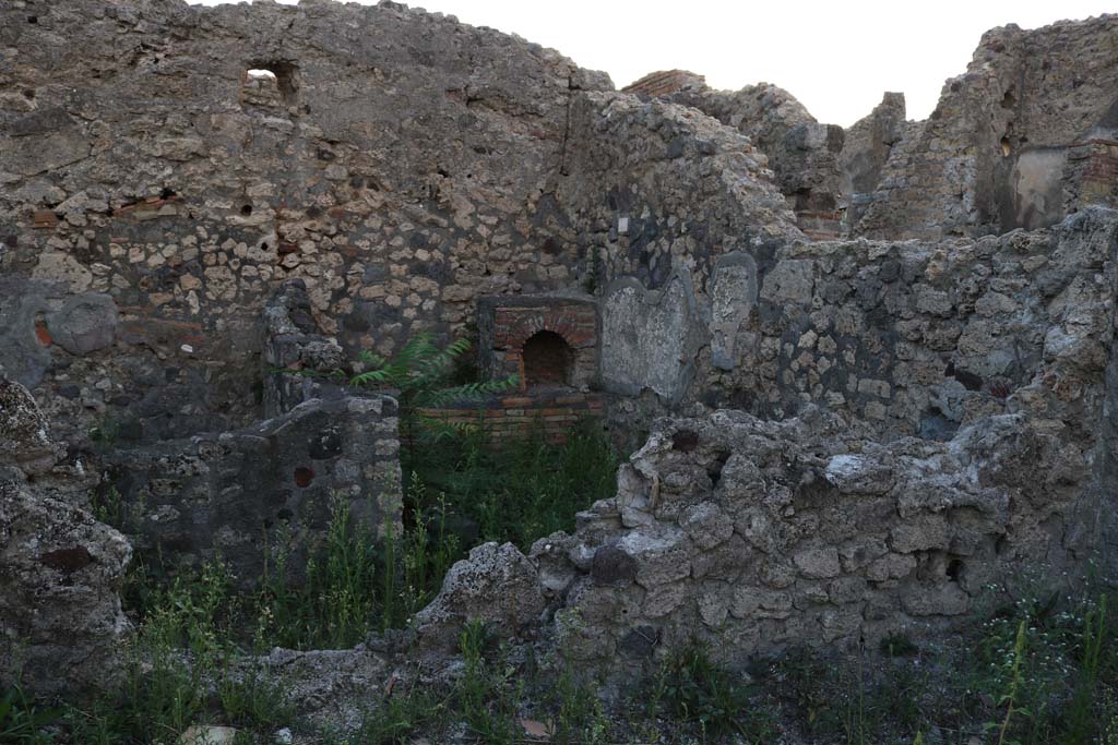 VI.7.7 Pompeii, from VI.7.11. December 2018. 
Looking west from room in north-west corner over wall towards kitchen area. Photo courtesy of Aude Durand.
