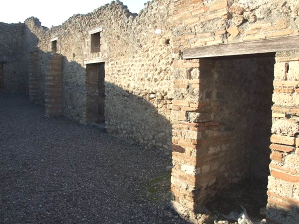 VI.7.15 Pompeii. December 2007. North side from entrance doorway. 
According to Fiorelli, Eschebach and Hobson, on the right, is the doorway into the latrine. See Pappalardo, U., 2001. La Descrizione di Pompei per Giuseppe Fiorelli (1875). Napoli: Massa Editore. (p.58)
See Eschebach, L., 1993. Gebäudeverzeichnis und Stadtplan der antiken Stadt Pompeji. Köln: Böhlau. (p.179) See Hobson, B. 2009. Pompeii, Latrines and Down Pipes. Oxford, Hadrian Books, (p.227) According to Hobson, in this latrine there is one support and one slot, which enabled a latrine to be identified. See Hobson, B., 2009. Latrinae et foricae: Toilets in the Roman World. London; Duckworth. (p.49, and fig 65).