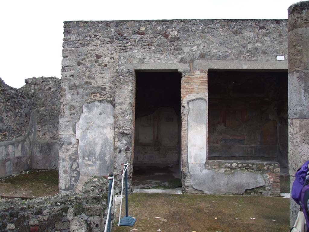 VI.7.18 Pompeii. December 2006. Looking south to doorways each leading into an oecus, with second oecus, on right.