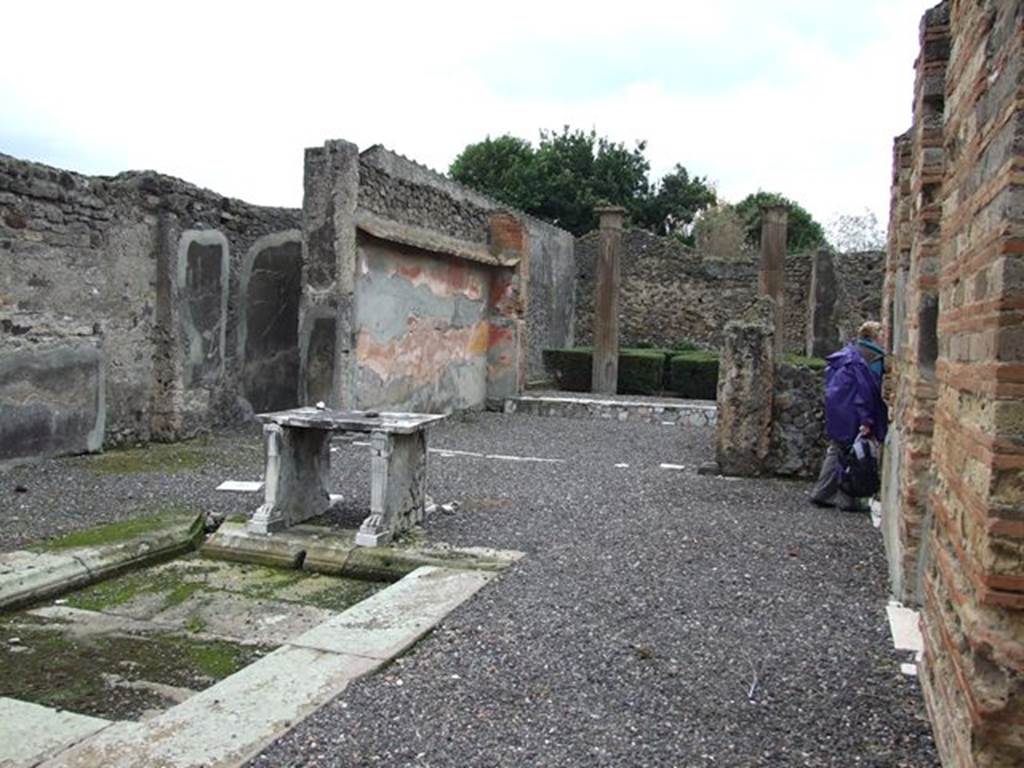 VI.7.19 Pompeii. December 2006. Looking west across atrium to tablinum with painted walls.