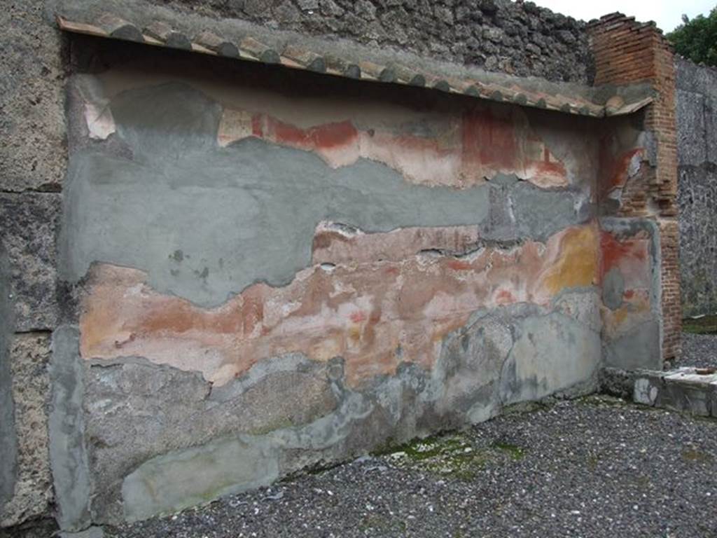 VI.7.19 Pompeii. December 2006. Tablinum with remains of painted south wall.