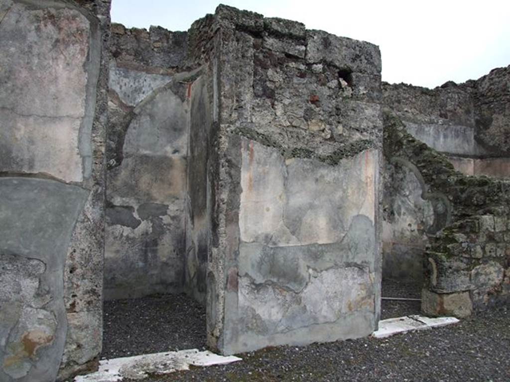 VI.7.20 Pompeii. December 2006. Doorways to rooms on south side of atrium.