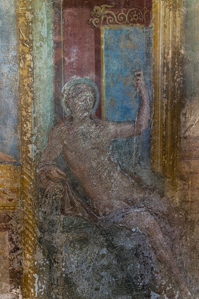 VI.7.23 Pompeii. October 2023. 
Cubiculum. Seated figure from west alcove, west wall. Photo courtesy of Johannes Eber.