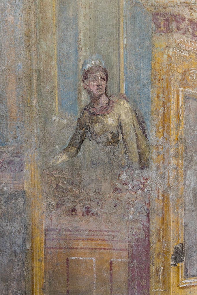 VI.7.23 Pompeii. October 2023. 
Cubiculum, detail of female figure on a balcony from north wall. Photo courtesy of Johannes Eber.