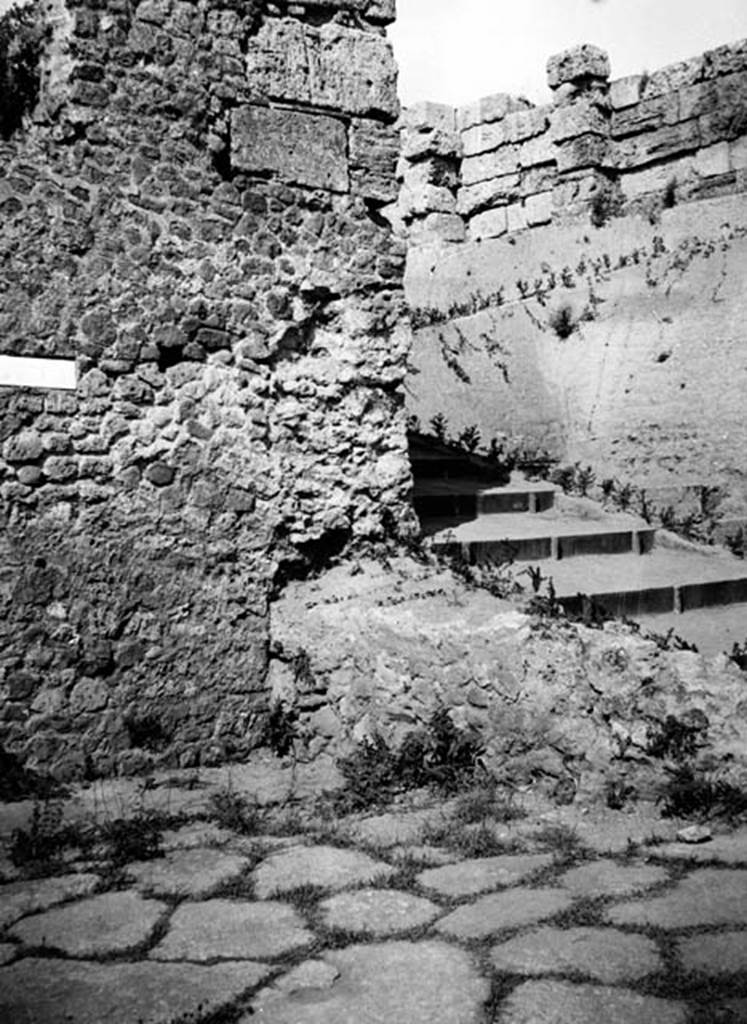 231625 Bestand-D-DAI-ROM-W.1269.jpg
VI.7.26 Pompeii. W.1269. North east corner of insula, remains of wall blocking the street, and steps to tower.
Photo by Tatiana Warscher. With kind permission of DAI Rome, whose copyright it remains. 
See http://arachne.uni-koeln.de/item/marbilderbestand/231625
