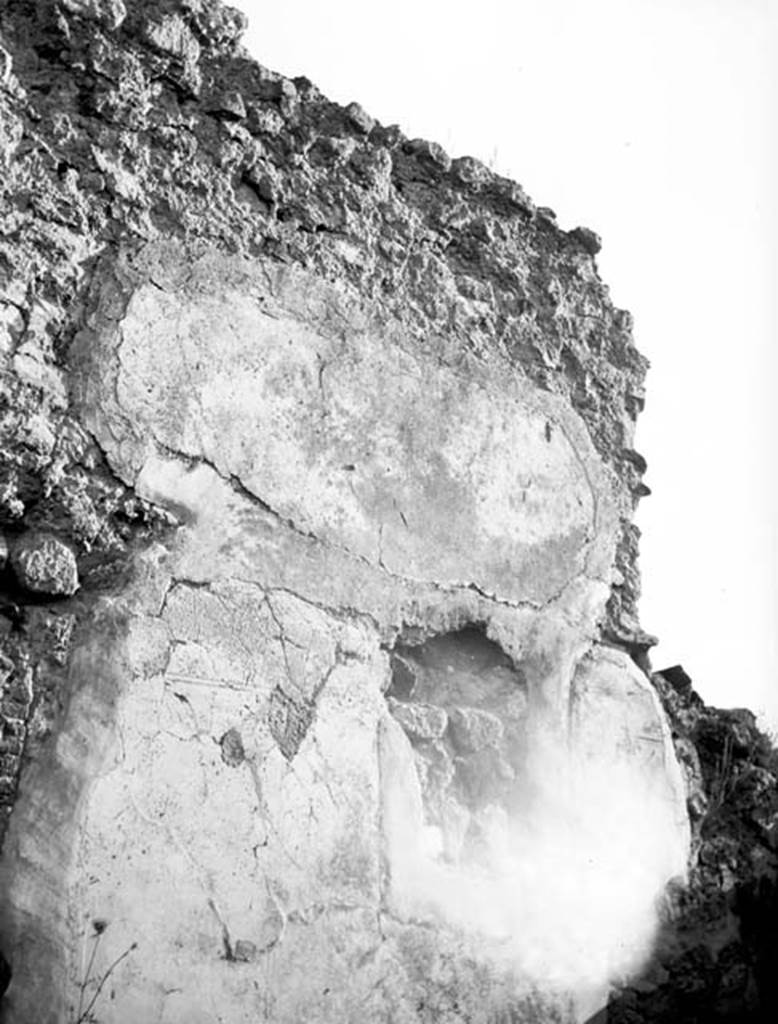 231762 Bestand-D-DAI-ROM-W.643.jpg
6.9.1 Pompeii. W643. Remains of decorated wall plaster. 
Photo by Tatiana Warscher. With kind permission of DAI Rome, whose copyright it remains. 
See http://arachne.uni-koeln.de/item/marbilderbestand/231762 
According to Warscher, this photograph showed the south wall of room “G” (our room 21) with traces of a cut painting. She wrote, “in the room “G” the south wall showed clear traces of a cut painting – the hole measured 0,55m + 0,40m.  I have not found any information on this painting, but I am in no doubt that it was there”.
See Warscher, T, 1938: Codex Topographicus Pompejanus, Regio VI, insula 9: Pars prima, (no. 24), DAIR, Rome.