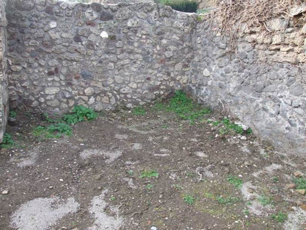 VI.9.1 Pompeii. December 2007. Room 13, looking west across kitchen.The oven or hearth would have been against the north wall, on the right. In the north-west corner, next to the oven, would have been the latrine. Against the south wall, on the left, would have been the stairs to the upper rooms.
See Cronache Pompeiane, IV, 1978, for article by Packer, J: Inns at Pompeii: a short survey (p.24-30)