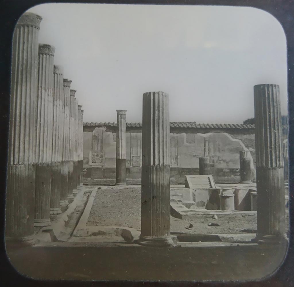 VI.9.2 Pompeii. c.1900. C. and G. Lantern slide published by A. Laverne. Peristyle 16, looking west across south end.