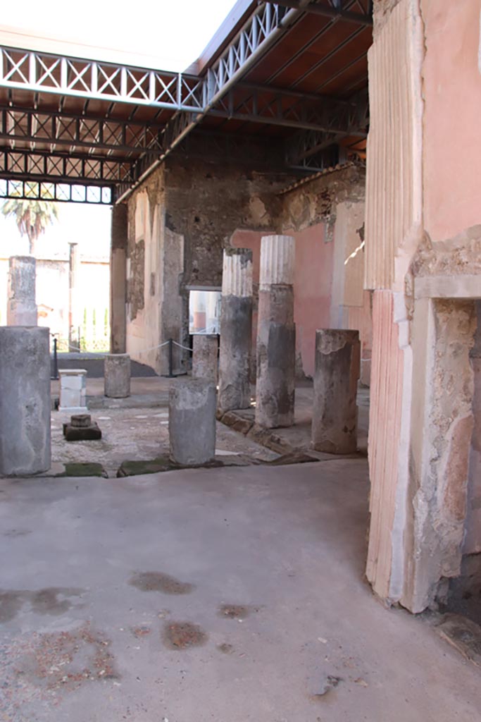 VI.9.6 Pompeii. October 2022. 
Room 3, looking south-east across impluvium in atrium from entrance doorway. 
Photo courtesy of Klaus Heese.