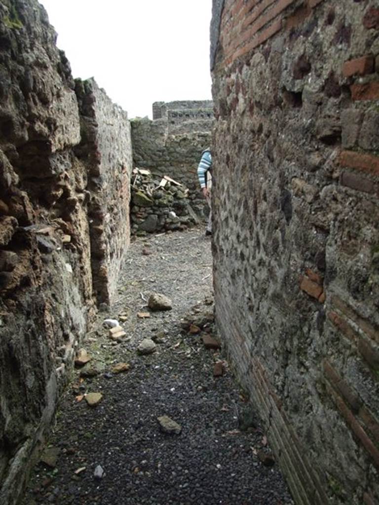 VI.9.6 Pompeii. March 2009. Corridor 26 at rear of large exedra leading to rear rooms of VI.9.7. Originally this did not connect with VI.9.7, but only led to two rustic rooms numbered 28 and 29.