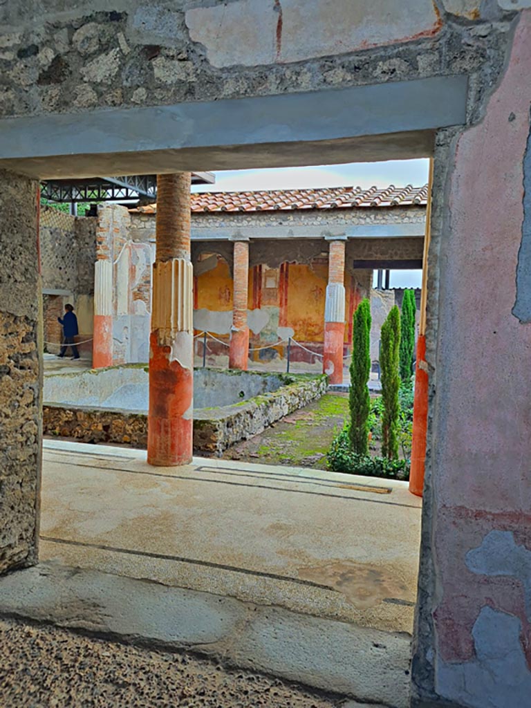 VI.9.6 Pompeii. November 2023. 
Doorway to room 6, entrance to peristyle on south side of room 4, the vestibule in atrium. Photo courtesy of Giuseppe Ciaramella.