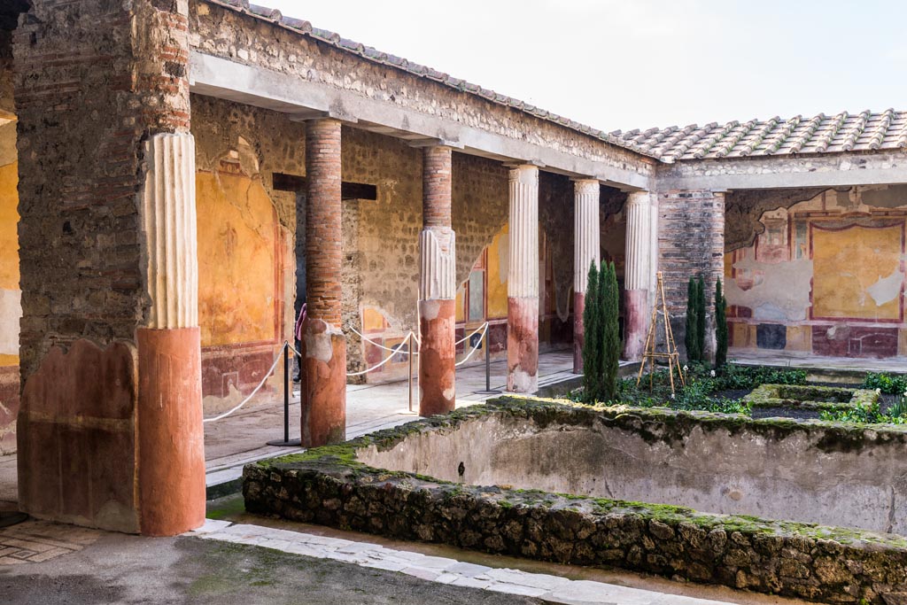 VI.9.6 Pompeii. January 2023. 
Room 6, looking towards south-west corner of peristyle from east portico. Photo courtesy of Johannes Eber.
