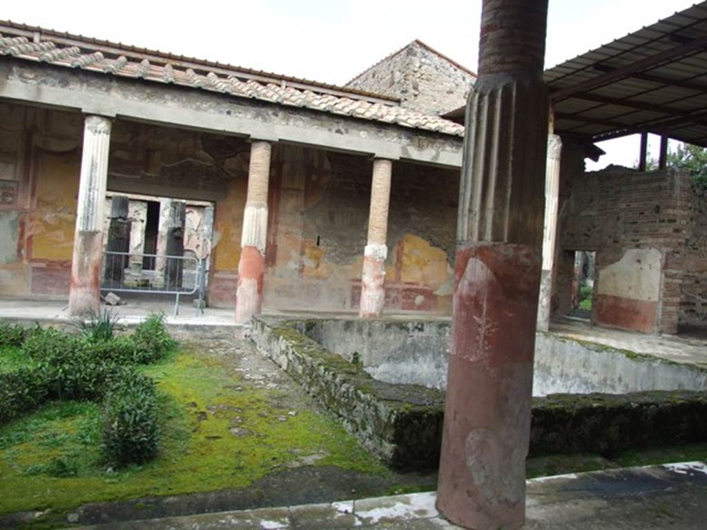 VI.9.6 Pompeii. March 2009.  Room 6, looking towards north side of peristyle from south side near doorway from atrium of VI.9.7