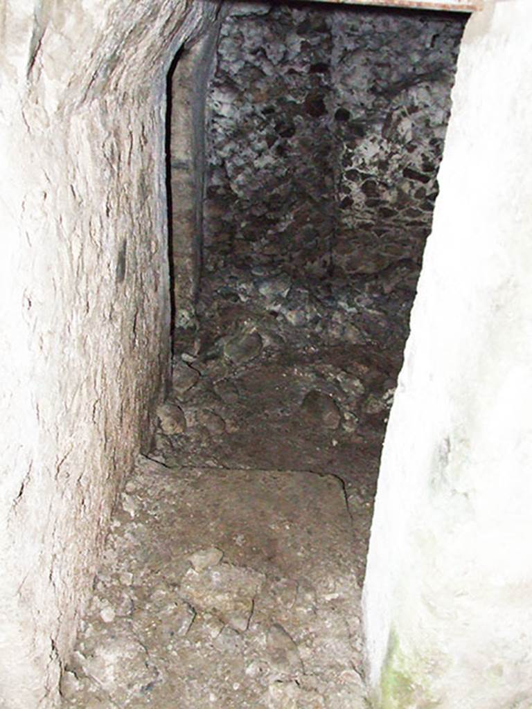 VI.9.10 Pompeii. March 2009. 
Doorway to second underground room, looking west from corridor. The doorway to third room can be seen in the room on the left.