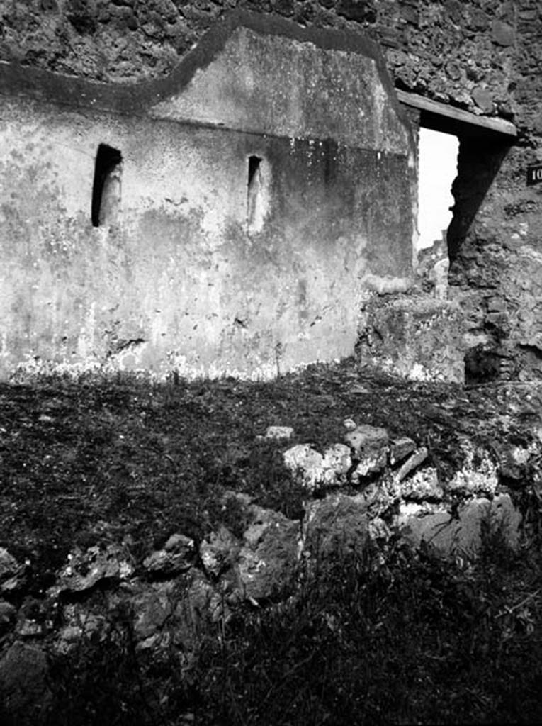 231331 Bestand-D-DAI-ROM-W.0943A.jpg
6.9.9 rear wall with two windows from latrine, and 6.9.10, Pompeii. W943A. Façade on Vicolo del Fauno, on south side of doorway 10. Looking north.
Photo by Tatiana Warscher. With kind permission of DAI Rome, whose copyright it remains. 
See http://arachne.uni-koeln.de/item/marbilderbestand/231331