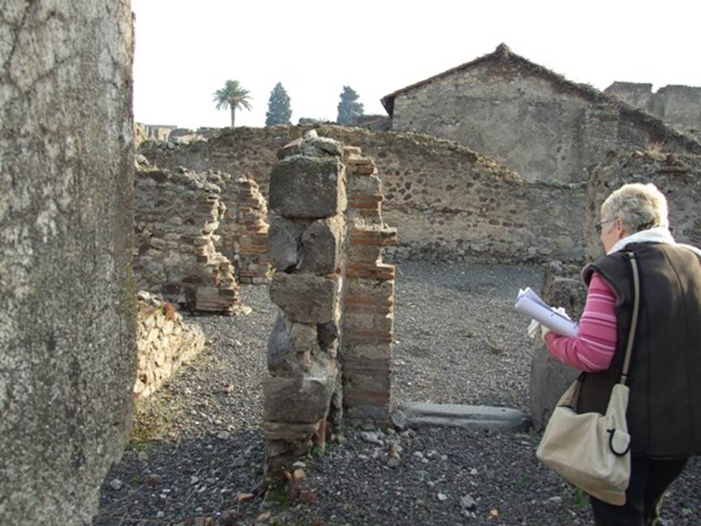 VI.9.14 Pompeii. December 2007. Looking south towards atrium 22, from corridor 29.
On the left would have been a window, overlooking the corridor/courtyard from room 27, an oecus.