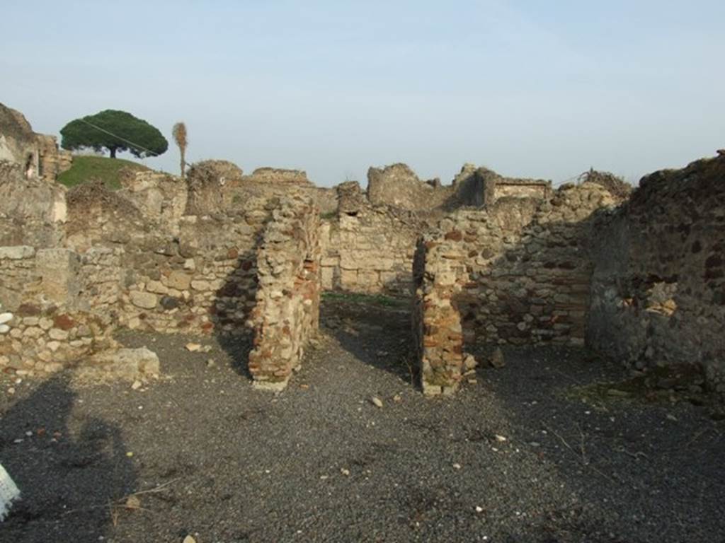 VI.9.14 Pompeii. December 2007. Looking east across secondary atrium 22 towards room 26, on left, room 25 in centre, and room 24, on right.