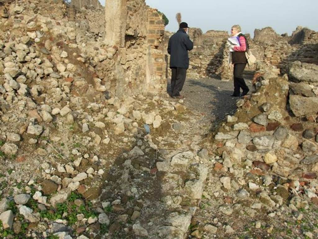 VI.9.14 Pompeii. December 2007. Looking east across remains of rooms on east side of VI.9.1 before room 33, the corridor/tablinum leading into VI.9.14.