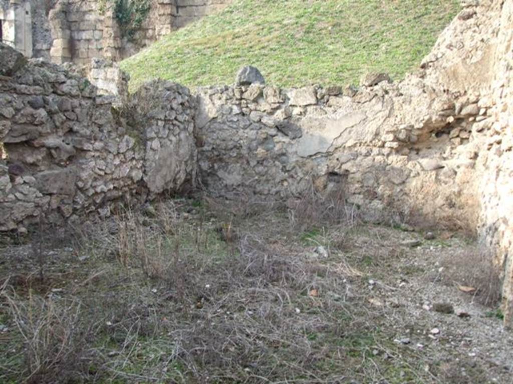 VI.9.14 Pompeii. December 2007. Large oecus 31 in north-west corner, looking north.
According to Packer, when found the north wall of this room was decorated with white panels separated by broad red borders above a low red dado.
See Cronache Pompeiane, IV, 1978, for article by Packer, J: Inns at Pompeii: a short survey (p.24-30)
See Bullettino Archeologico Napolitano, 1, 1843, p.68-70.