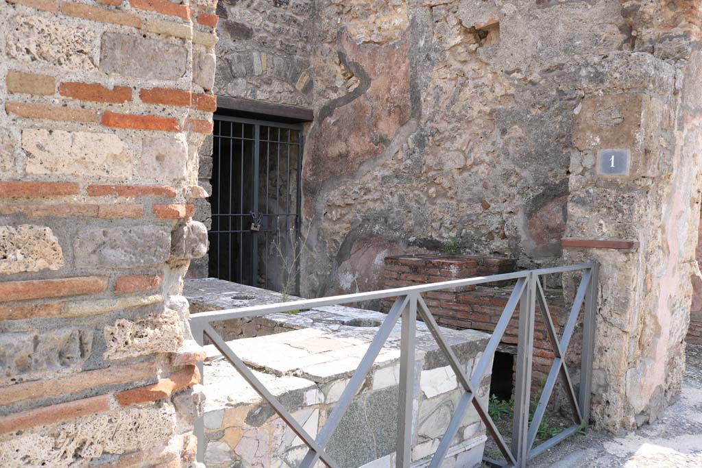 VI.10.1 Pompeii. December 2018. 
Looking south-east across bar-room towards doorway to two rear rooms. Photo courtesy of Aude Durand.