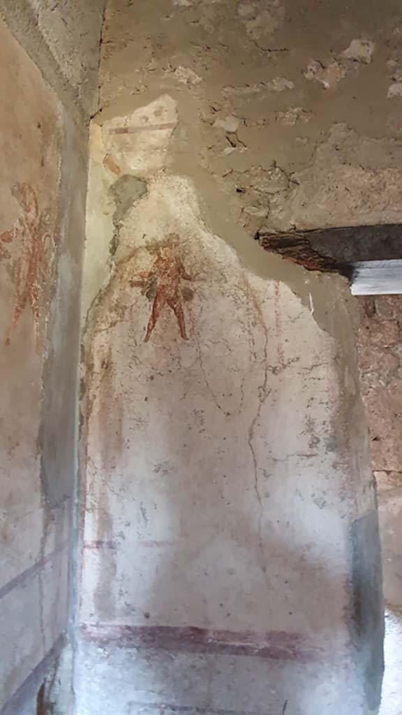 VI.10.1 Pompeii. July 2021. 
Painted cupid on west wall in south-west corner, with doorway, on right.
Foto Annette Haug, ERC Grant 681269 DÉCOR.