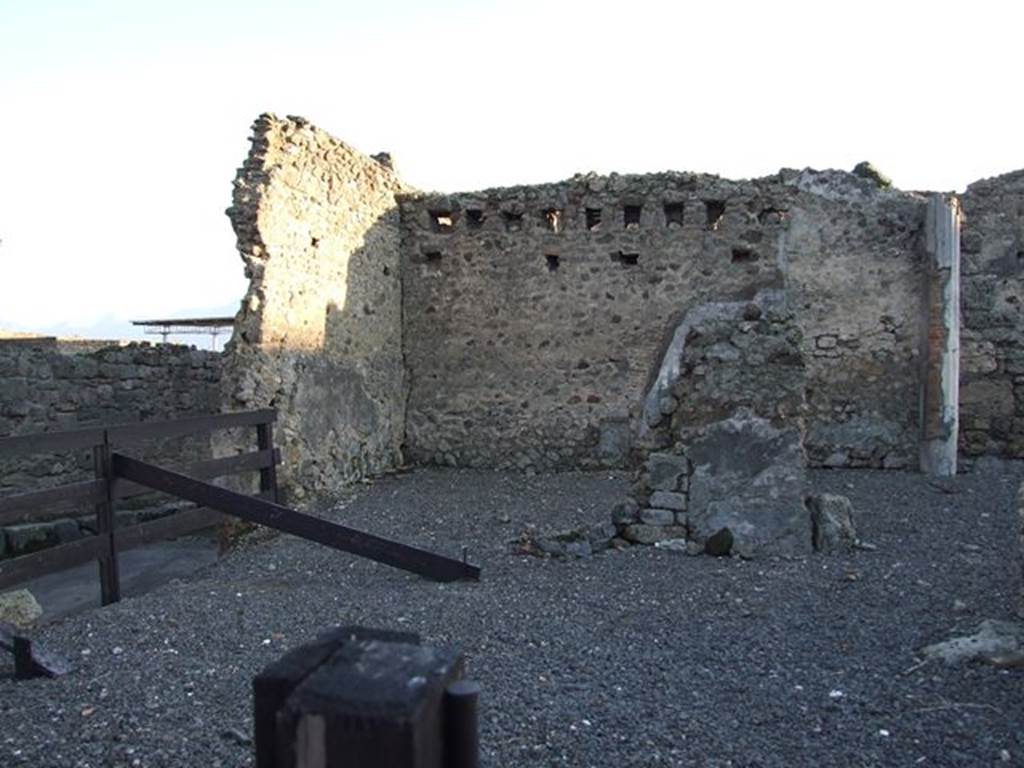 VI.10.2 Pompeii. December 2006. Looking towards site of triclinium in south-east corner. 
Looking south from Vicolo di Mercurio across area bombed in 1943. View showing total devastation of north-east sector of the house.
According to De Jorio –
“Questa casa fu scavata parte nel 1826 e tutta poi nel 1831.
In quest’ultima epoca si era disotterrato alle spalle del suo tablino un portico ed un piccolo viridario, donde per una scaletta si cala uscendo nell’opposto vicolo,e nel tempo stesso si discende ad una stanza sotterranea.”
(Trans: “This house was excavated in part in 1826 and then completely excavated in 1831.
In this last era a portico and a small garden had been unearthed behind the tablinum, where a staircase descended into the opposite vicolo, and at the same time descended to an underground room.")
See De Jorio A., 1836. Guida di Pompei. Napoli: Fibreno, (p.105).