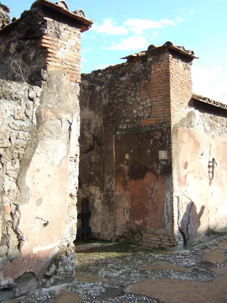 VI.10.2 Pompeii. December 2005. Entrance stucco.