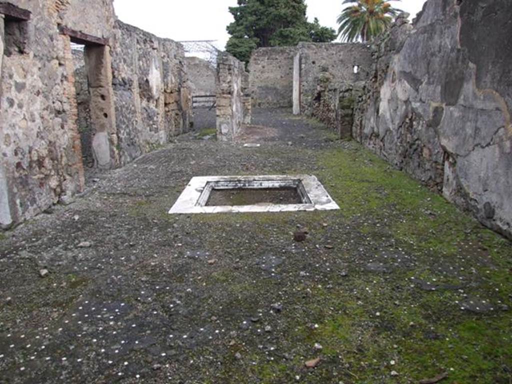 VI.10.2 Pompeii. March 2009. Atrium with remains of patterned floor, cocciopesto with patterned white stones. The north wall of the atrium would have been decorated with a high red dado. The middle zone of the wall was colourless, but panels with garlands could have been seen, the upper zone was illegible. The south wall was illegible.
See Bragantini, de Vos, Badoni, 1983. Pitture e Pavimenti di Pompei, Parte 2. Rome: ICCD. (p.230, atrio 2)