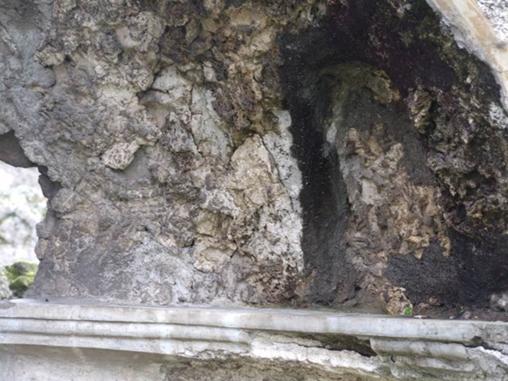 VI.10.7 Pompeii. March 2009. Room 15, south side of garden area.  
Second small niche in rear wall above horizontal rim in apsed niche at east end.