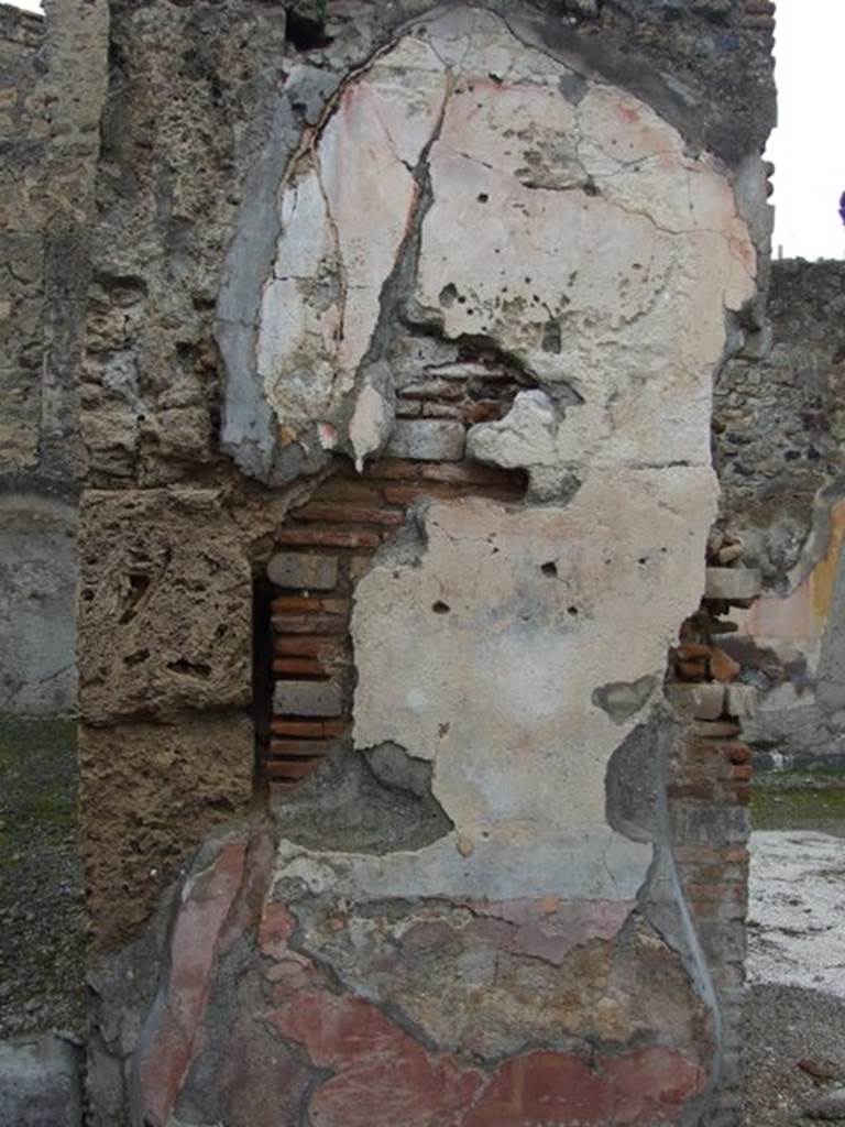 VI.10.11 Pompeii. March 2009. Room 3, atrium with plaster between room 9 and room 8.
A painting of Zeus was seen on this pilaster.