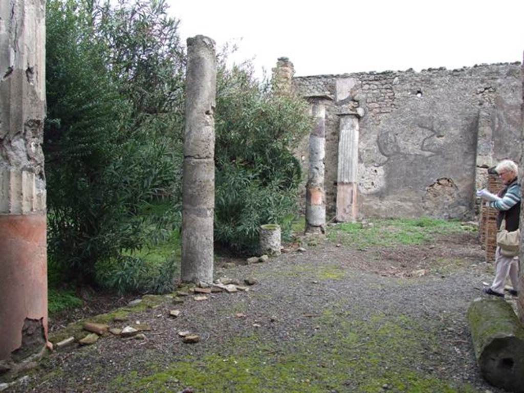 VI.10.11 Pompeii. March 2009. Room 17, looking east along south portico of garden.  
According to Jashemski, the garden had a portico on the south supported by two pillars and four columns. It was joined by a low wall with a space for planting in the top. In the centre of the garden, there are the remains of the masonry summer triclinium. In the centre of the triclinium, the base for the table still remains.
See Jashemski, W. F., 1993. The Gardens of Pompeii, Volume II: Appendices. New York: Caratzas. (p.141-2)