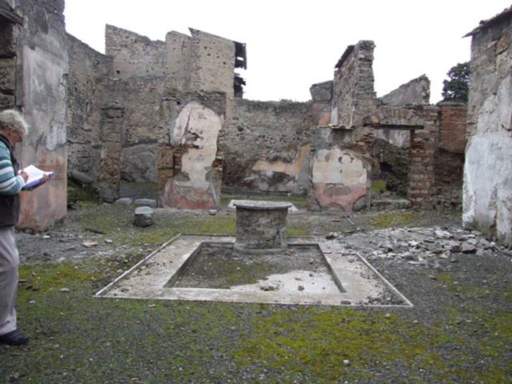 VI.10.11 Pompeii. March 2009. Room 3, looking north across atrium. According to Winsor Leach, the two pilasters on the north side held painted panels of Zeus, on the left, and Hera enthroned, on the right.
See The Social Life of Painting in Ancient Rome and on the Bay of Naples, by Eleanor Winsor Leach.