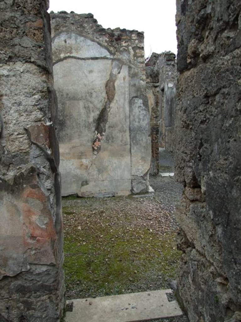 VI.11.9 Pompeii. March 2009. Room 6, north wall, with small doorway into room 7.