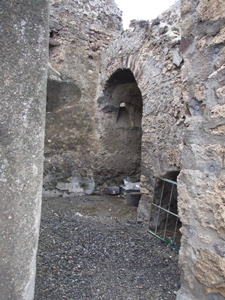 VI.11.9 Pompeii. December 2006. Room 8, looking north-west through doorway.