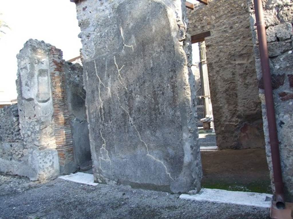 VI.11.9 Pompeii. December 2007. Room 3, atrium, east side. 
Looking east through rear doorway of room 29, into Tetrastyle atrium of VI.11.10.
On the left is the doorway to corridor 48, also linking to atrium of VI.11.10.