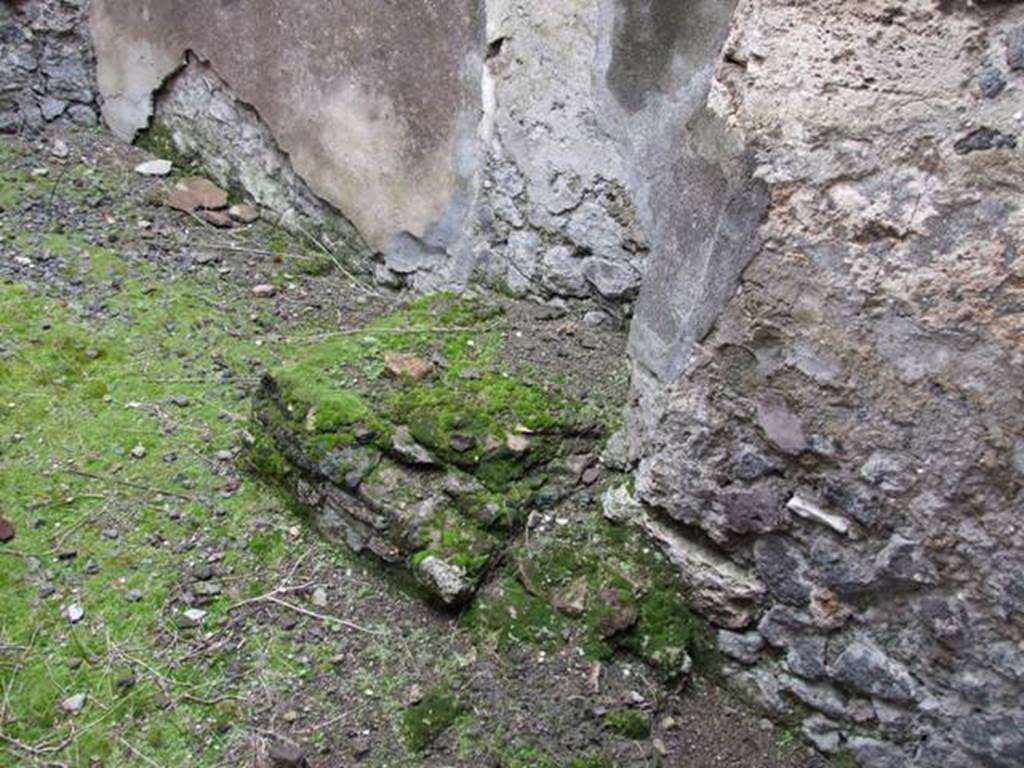 VI.11.9 Pompeii. March 2009. Room 2, south wall, leaning against the wall is a stone base for the wooden stairs.