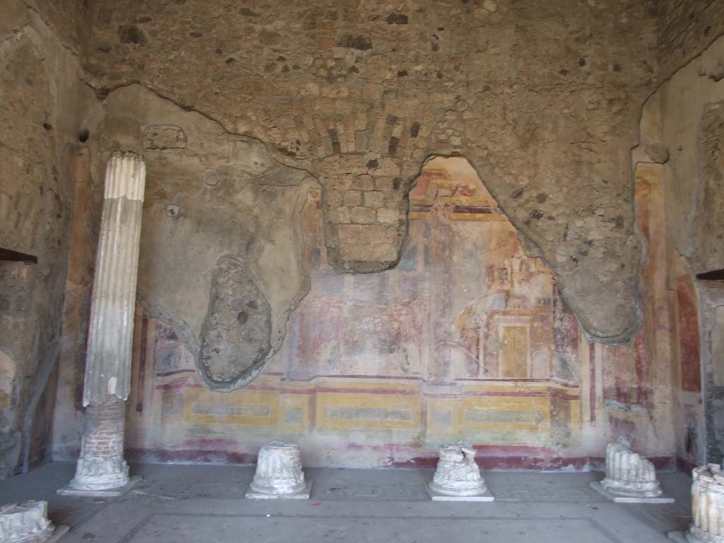 VI.11.10 Pompeii. December 2007. Room 43, north wall of Corinthian oecus.
The doorway to small room 44 is on the left, the north-west corner; the doorway to room 45 is on the right, the north-east corner.