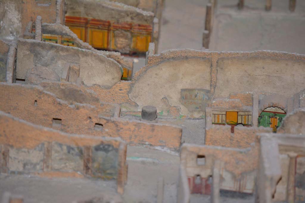 VI.11.9/10 Pompeii. July 2017. Across centre, looking east towards bakery wall in room 16 with lararium painting.
In the centre, on the right, are the painted east walls of room 20 and 21 of the baths’ area.
Note the entrance doorway, now blocked, leading from Vicolo del Fauno directly into the bakery.
From cork model in Naples Archaeological Museum.
Foto Annette Haug, ERC Grant 681269 DÉCOR.