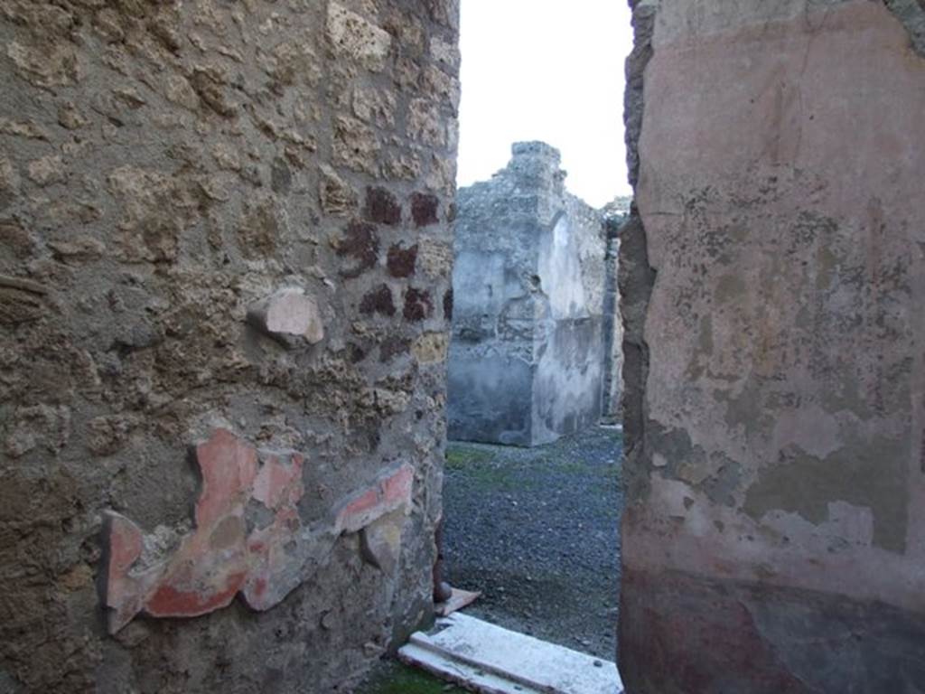 VI.11.10 Pompeii. December 2007. Room 29, west wall. Looking through other doorway into atrium 3 of VI.11.9.